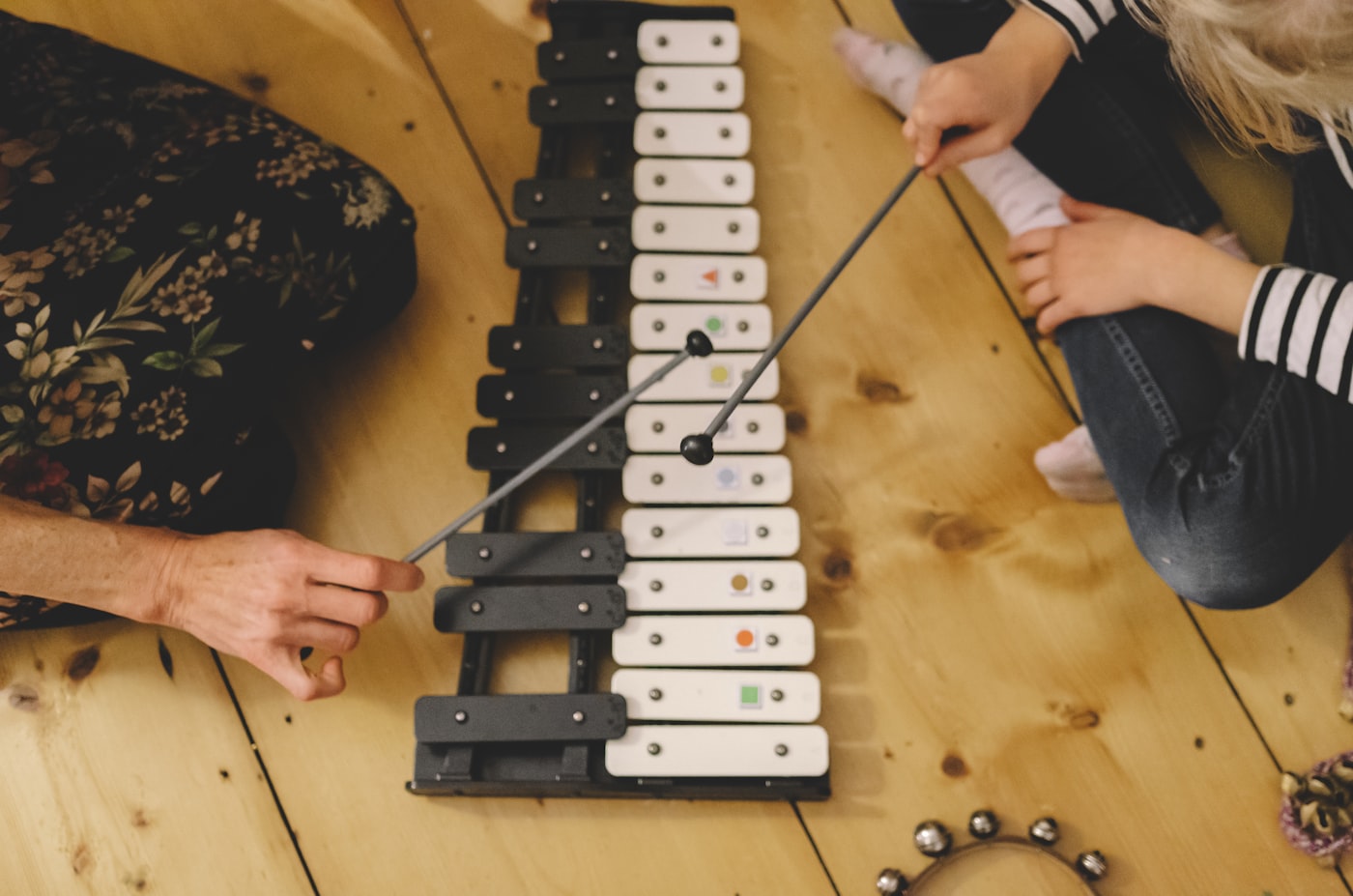 Guided percussion play, hand over hand